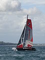 Extreme 40 class sailing catamarans, seen racing off Egypt Point, Cowes, Isle of Wight during Cowes Week in 2011. Cowes was a stage on the Extreme 40 races for 2011. Races were run off Egypt Point (by the Extreme 40 tent), and were separate from the standard Cowes Week races (that start from the Royal Yacht Squadron). This is the Artemis Racing boat.