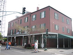 Post-Katrina WWOZ studios were on the second floor of this French Quarter building FQ1830RedStoresWWOZ.jpg