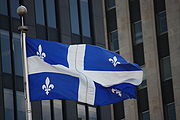 The Fleudelis flying in downtown Montreal