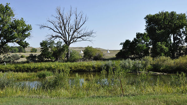 Fort Laramie National Historic Site, with tipis across Laramie River, where the treaty of 1868 was negotiated.