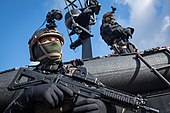 French special forces operator armed with a SIG-553.jpg