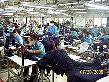 Factory workers in the capitalist mode of production Garment Factory Workers in Thailand.jpg