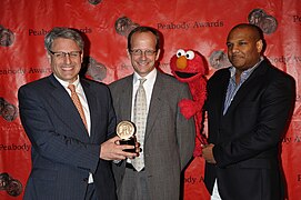 Gary Knell, Terry Fitzpatrick, Elmo and Kevin Clash, May 2010 (1).jpg