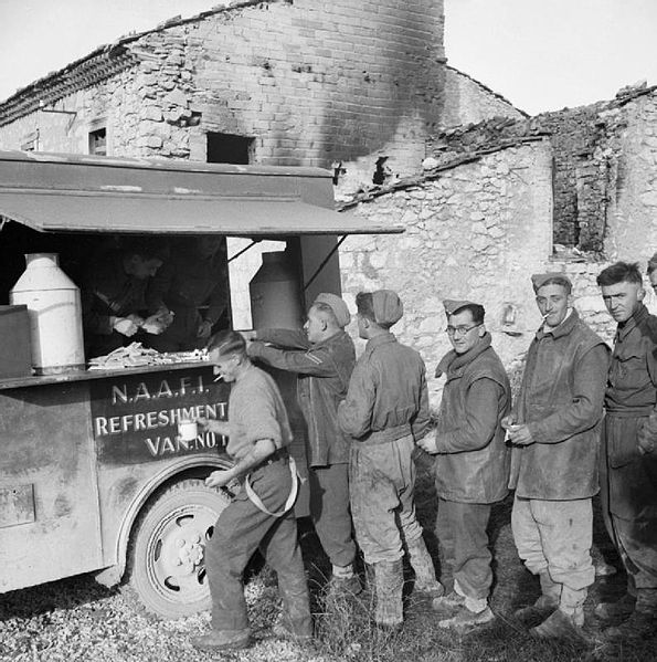 File:Gunners of 78th Field Regiment, Royal Artillery queuing at a NAAFI refreshment van in Italy, 22 November 1943. NA8953.jpg