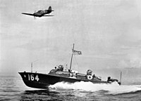 The Type Two 63 ft High-speed launch, designed by Hubert Scott-Paine in 1937. HSL 164 with RAF Hurricane off Colombo c1943.jpg