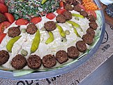 Lebanese mixture of food including falafel, hummus and tabbouleh