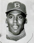 Hall of Fame hurlers Don Drysdale and Sandy Koufax each started over 200 games with Dodgers batterymate John Roseboro (center).