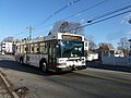A bus of the Lowell Regional Transit Authority driving south on Stevens Street. Picture taken immediately nearby the intersection of Stevens Street and Light Avenue, Lowell, Massachusetts.