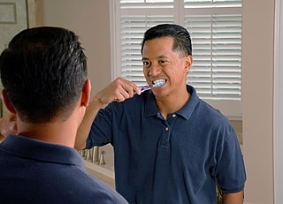 <span class="mw-page-title-main">Tooth brushing</span> Act of scrubbing teeth with a toothbrush