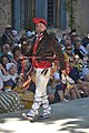 Vendedor ambulant d'abarcas tipicas d'a Catalunya d'o Norte u espadrilles.