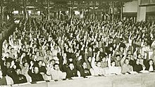 Delegates voting at the first session of the 1st NPC. Members voting in the 1st meeting of the 1st NPC.jpg