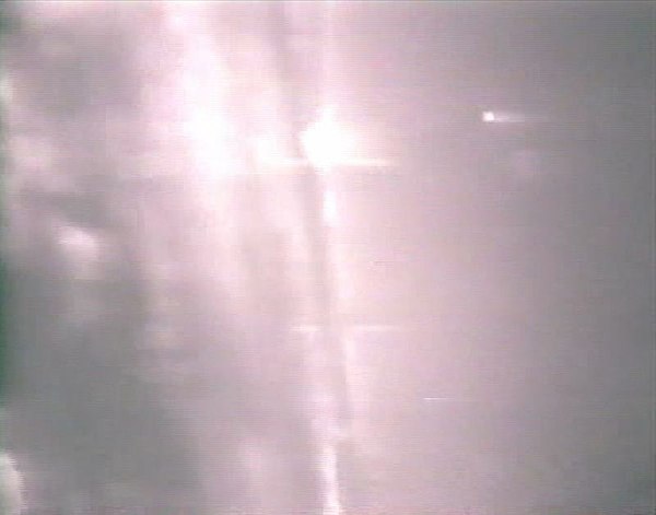 Gun camera still of the lead F-14 showing the second MiG-23 exploding after being hit by an AIM-9 Sidewinder missile