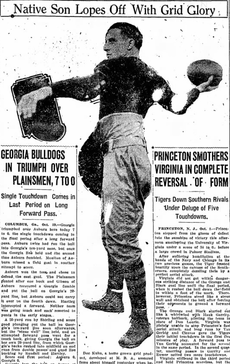 From a newspaper, Kuhn in uniform, throwing a football