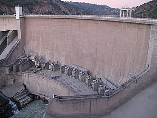 The Rapel Dam is an arch dam on the Rapel River about 19 km (12 mi) north of La Estrella in the Libertador General Bernardo O'Higgins Region, Chile. The primary purpose of the dam is hydroelectric power generation and it supports a 377 MW power station. The dam was completed in 1968 and is owned by Endesa. It creates the largest reservoir in Chile with a capacity of 700,000,000 m3 (567,499 acre⋅ft). The dam withstood the 7.5 Mw 1985 Rapel Lake earthquake with only minor damage. It was centered 45 km (28 mi) from the dam.