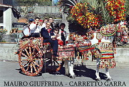 Mauro Giuffrida, with his prize winning Sicilian "Garro" Carretto from Catania, Sicily Sicilian Wood Cart Garro.JPG