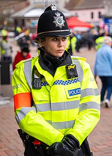 Female Staffordshire Police officer wearing a "coxcomb" helmet, 2023 Staffordshire Police - Female officer.jpg