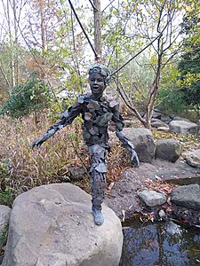 Statue of a child made of vines