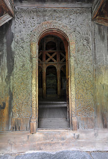 Borgund Stave Church west portal with archivolt. Stave church Borgund west portal.jpg