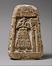 Estela de Usungal (2900–2700 a.C.) descoberto em Uma, Mesopotâmia. Atualmente está no Museu Metropolitano de Arte, Nova Iorque