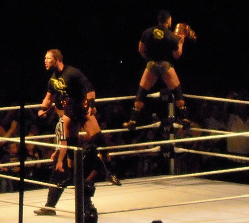 Otunga (right) and McGillicutty as the WWE Tag Team Champions