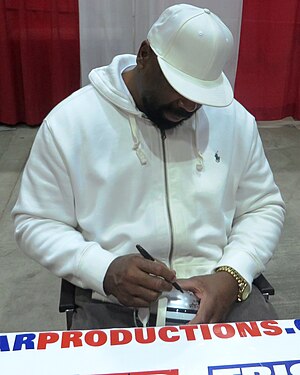 Too Tall Jones signs autographs in Jan 2014.jpg