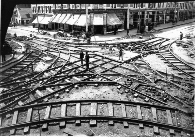 Tramway crossing under construction at Ste. Catherine and St. Lawrence in 1893