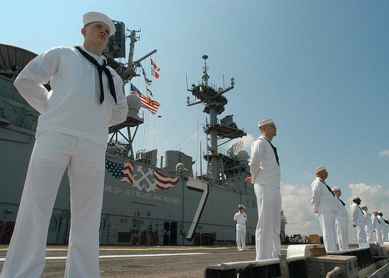 File:US Navy 060606-N-6214F-050 Sailors aboard the amphibious assault ship USS Iwo Jima (LHD 7) man the rails as they depart from Naval Station Norfolk.jpg