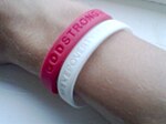 The Make Poverty History white wristband and a red Christian band. Wristbands.jpg