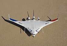 X-48 parked on Rogers Dry Lake. Boeing name and Cranfield Aerospace logo are visible.