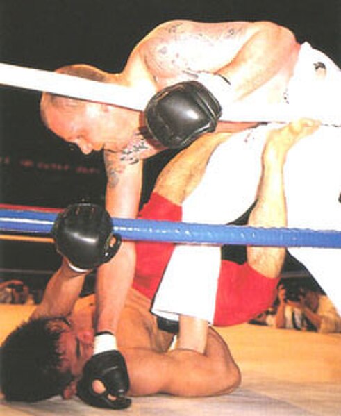 Shootist Yuki Nakai (bottom) attempts a Heel Hook at Gerard Gordeau (top) at Vale Tudo Japan Open 1995.