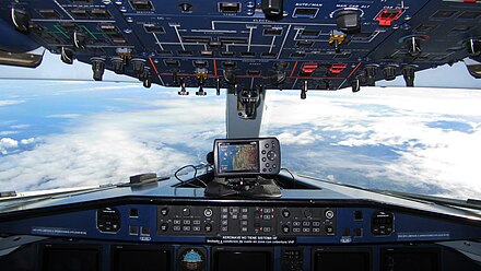 Forward-facing internal view from the cockpit of an in-flight 328