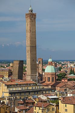 Asinelli Tower (higher) and Garisenda Tower (left). Santi Bartolomeo e Gaetano - on the right. Bologna, Italy Bologna, Italy