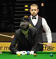 Deutsch: Bild aufgenommen in Berlin während des German Masters im Snooker 2013. Barry Hawkins und Michaela Tabb. English: Picture taken in Berlin during the Snooker German Masters in 2013. Barry Hawkins und Michaela Tabb.