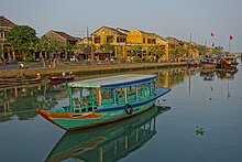 Hoi An, a trading port dating from the 15th to the 19th century Boat by the water - Hoi An (16922189291).jpg