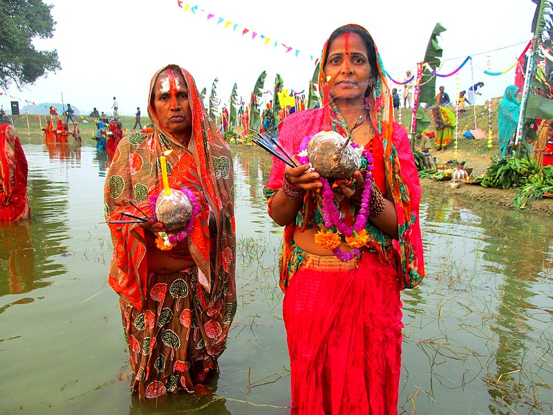 File:Celebrating Chhath in Kataiya, Saptari by giving Argha to Sun God.jpg