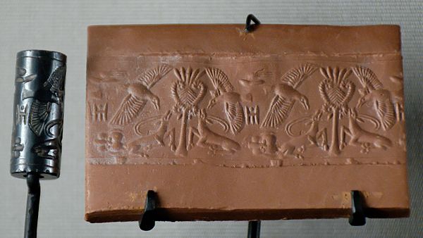 Antelopes attacked by birds: cylinder seal in hematite and its impression. Late Bronze Age II (maybe 14th century BC), from Cyprus in the Minoan perio