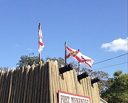 The flag of Florida (center) alongside the Cross of Burgundy in 2013. Flags of Florida in San Agustin (St. Augustine).jpg