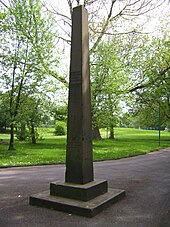 Flood obelisk showing 1866 flood level of 8 feet 6 inches (2.59 m). A second flood line was added at 4 feet 3 inches (1.30 m) after the floods of 1870 Flood obelisk, Peel Park.jpg