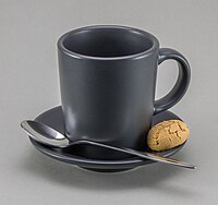 Rank: 6 Empty, gray espresso cup with amaretto