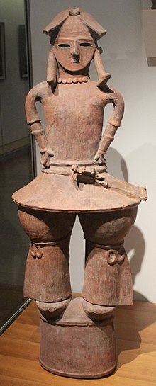 6th century (Kofun period) Haniwa depicting a warrior wearing the male mizura hairstyle, in which the hair is parted into two bunches or loops