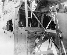 The damage caused by one hit by Seydlitz in the superstructure HMS Colossus Jutland damage 1916 IWM Q 55600.jpg