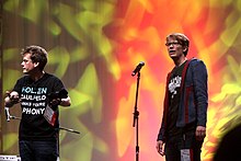 Hank (right), with his brother, John, at VidCon 2012 Hank & John Green (7478134566).jpg