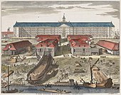 The shipyard of the United East India Company (VOC) in Amsterdam (1726 engraving by Joseph Mulder). The shipbuilding district of Zaan, near Amsterdam, became one of the world's earliest known industrialized areas, with around 900 wind-powered sawmills at the end of the 17th century. By the early seventeenth century Dutch shipyards were producing a large number of ships to a standard design, allowing extensive division of labour, a specialization which further reduced unit costs. Joseph Mulder - Gezicht op het Oost-Indisch Magazijn te Amsterdam (1726).jpg