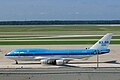 A KLM Boeing 747 with a navy blue cheatline