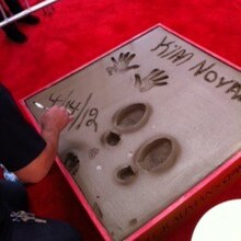 Novak was honored in a handprint and footprint ceremony at Grauman's Chinese Theatre in 2012. Kim Novak signature, handprint and footprint - Grauman's Chinese Theatre.JPG