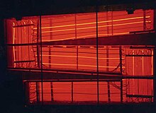 MSRE air-cooled heat exchanger glowing a dull red due to high temperature. MSRE Heat Exchanger.JPG