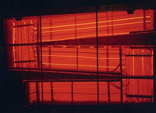 MSRE air-cooled heat exchanger glowing a dull red due to high temperature.