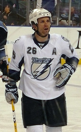 Martin St. Louis with the Lightning during the 2009–10 season. He signed a four-year extension with the team in the 2010 off-season.