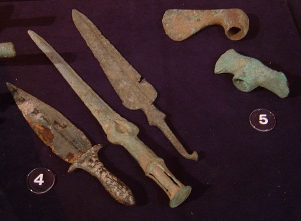 Mesopotamian bronze daggers, axe head and mattock REM.JPG