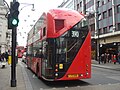 Route 390 bus with rear door closed Saturday 7 December 2013, 11:59